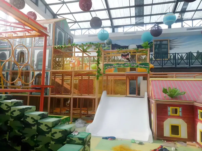 Colorful jungle-themed indoor soft play structure for kids and toddlers