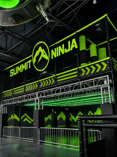 Summit Ninja Challenge indoor family entertainment center project in Michigan, customized with a commercial ninja course by Woozone Playground.