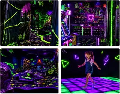 An immersive themed indoor adventure park featuring a custom interactive pixel floor, stylized Glo Golf zones (jungle, pyramid, dragon), and an arcade counter at Summit Ninja Challenge, demonstrating Woozone's turnkey commercial indoor play design.